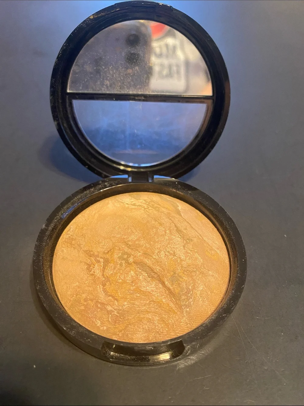 This item is a Laura Geller Baked Balance-N-Brighten Color Correcting Foundation